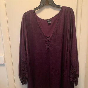 Sexy blouse with lace trim.